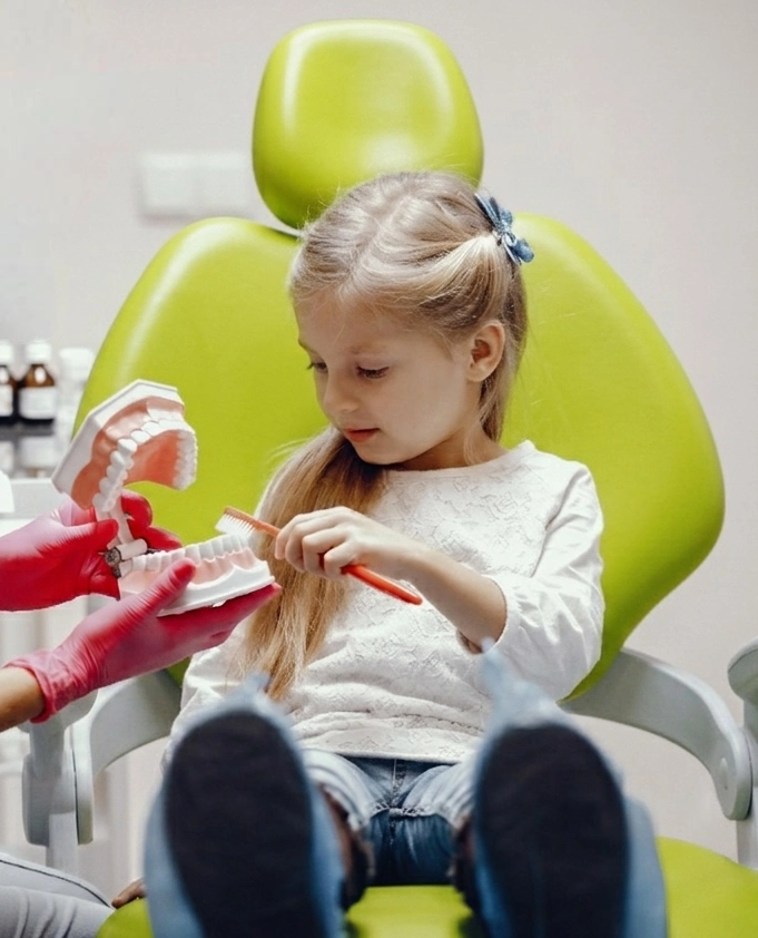 niño en dentista